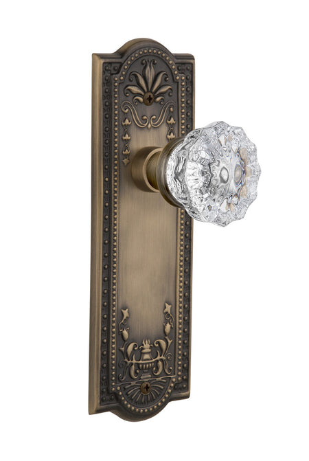 Nostalgic 701837: Meadows Backplate w/Clear Crystal Glass Knob Privacy Door Set - Antique Brass