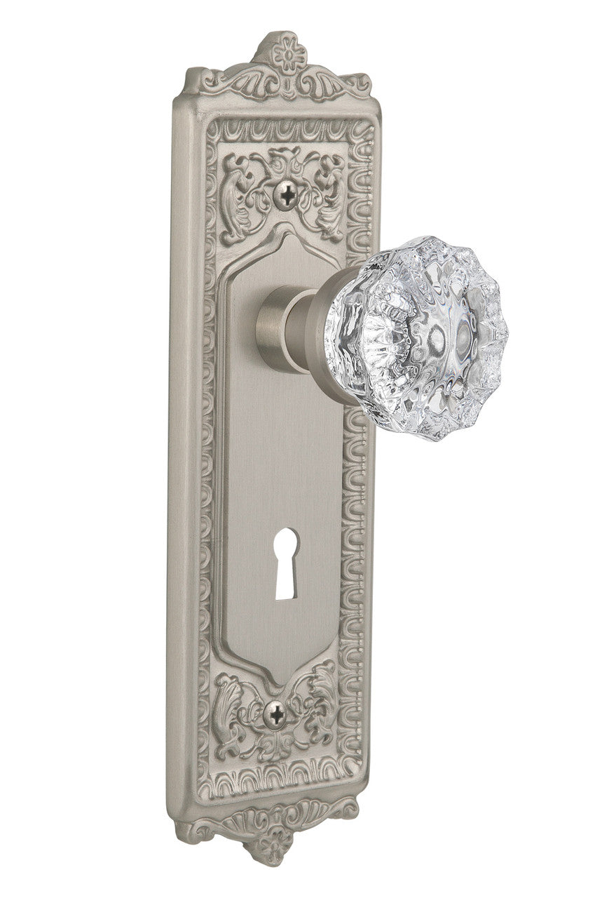 Nostalgic 701935: Egg & Dart Backplate w/Clear Crystal Glass Knob Passage Door Set - Satin Nickel