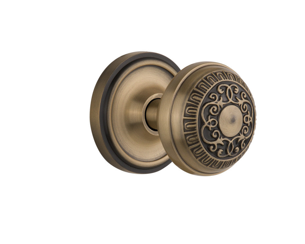 Nostalgic 701960: Classic Rosette w/Egg & Dart Knob Passage Door Set - Antique Brass
