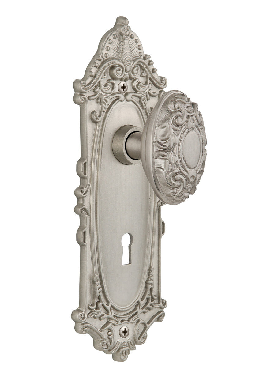 Nostalgic 702025: Victorian Backplate w/Victorian Knob Passage Door Set - Satin Nickel