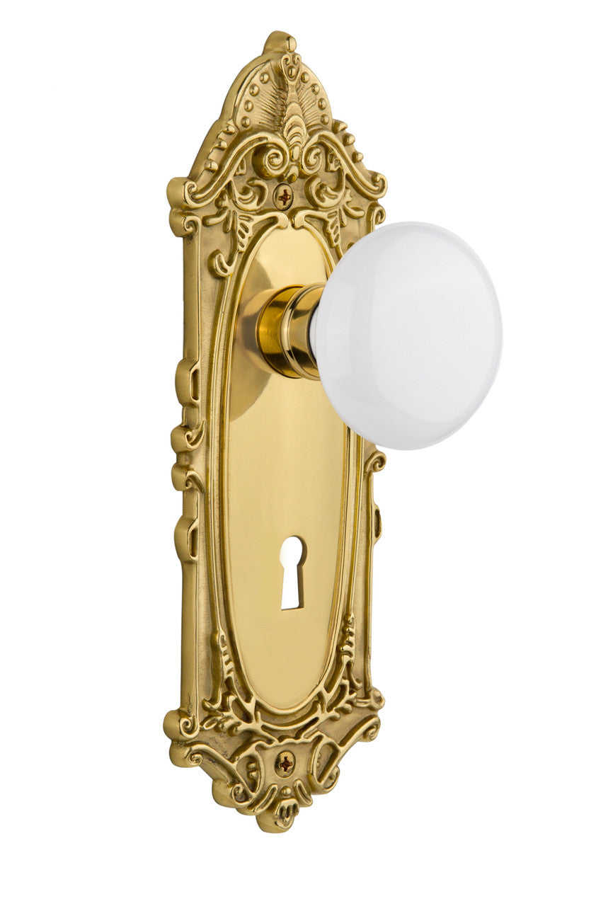 Nostalgic 702057: Victorian Backplate w/White Porcelain Knob Passage Door Set - Polished Brass