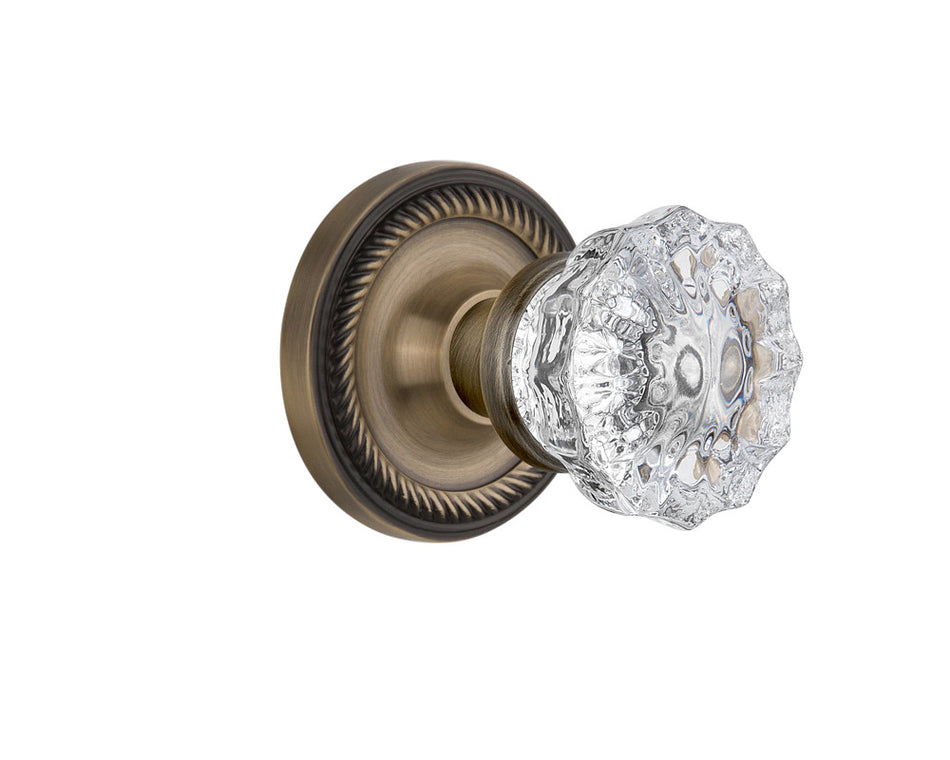 Nostalgic 702127: Rope Rosette w/Clear Crystal Glass Knob Privacy Door Set - Antique Brass