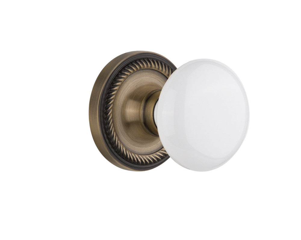 Nostalgic 702134: Rope Rosette w/White Porcelain Knob Single Dummy Door Set - Antique Brass
