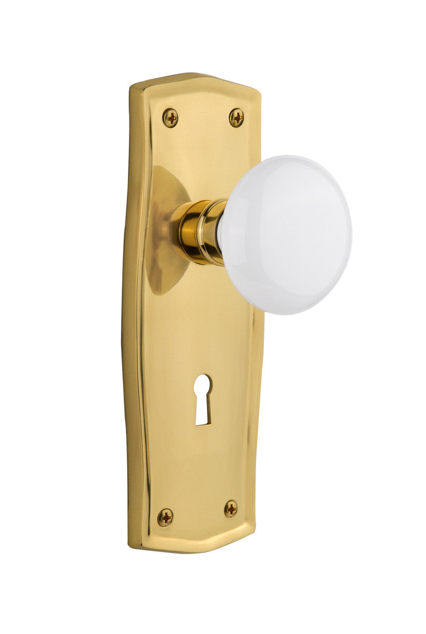 Nostalgic 702162: Prairie Backplate w/White Porcelain Knob Passage Door Set - Polished Brass