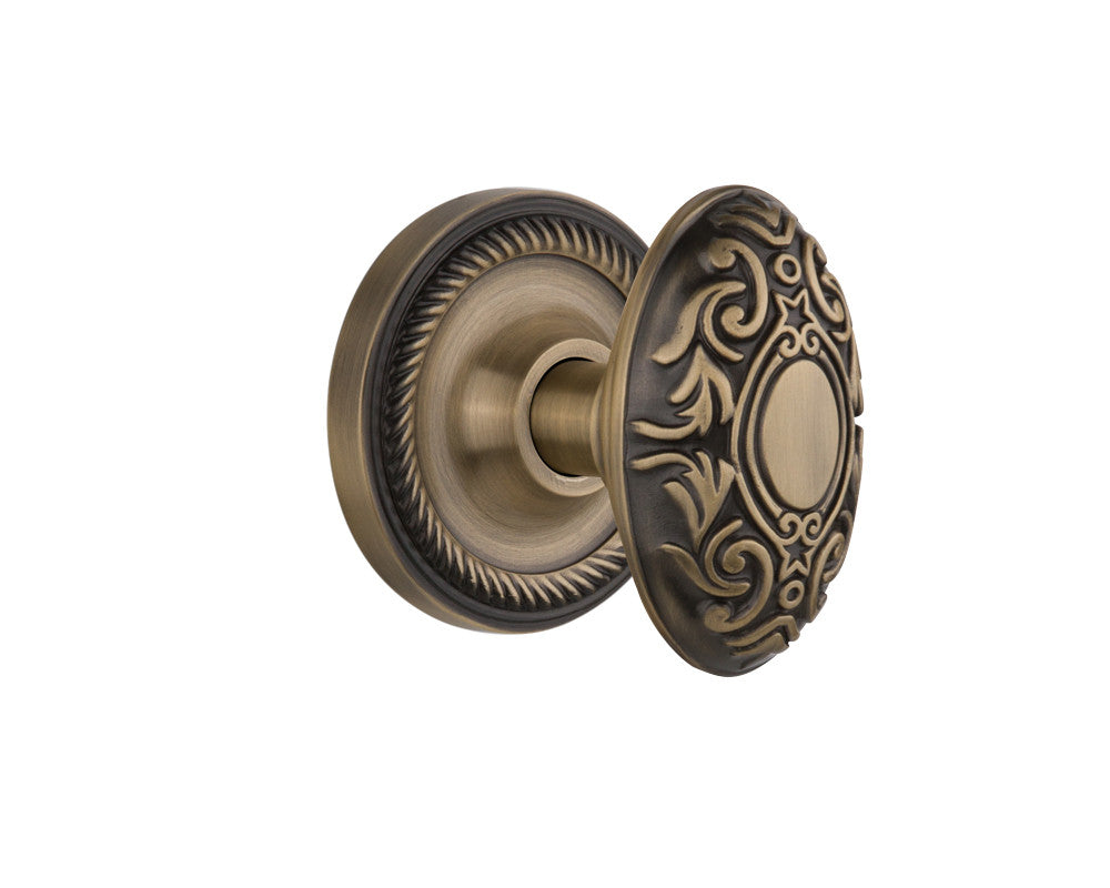 Nostalgic 702530: Rope Rosette w/Victorian Knob Passage Door Set - Antique Brass