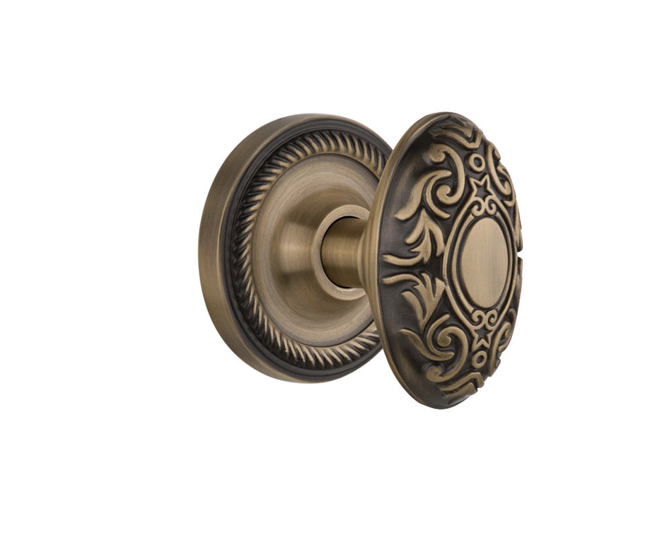Nostalgic 702530: Rope Rosette w/Victorian Knob Passage Door Set - Antique Brass