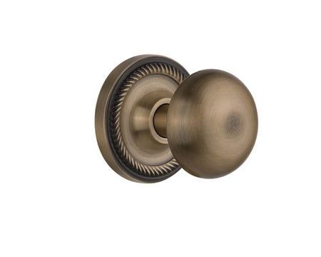 Nostalgic 702575: Rope Rosette w/New York Knob Privacy Door Set - Antique Brass