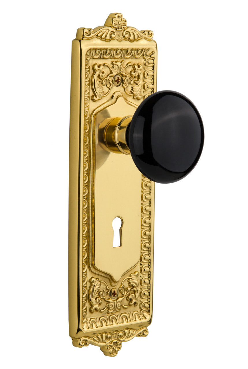 Nostalgic 702872: Egg & Dart Backplate w/Black Porcelain Knob Single Dummy Door Set - Unlacquered Brass