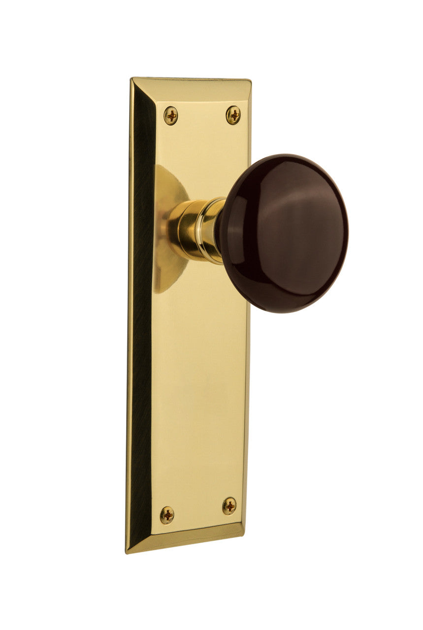 Nostalgic 702912: New York Backplate w/Brown Porcelain Knob Single Dummy Door Set - Unlacquered Brass