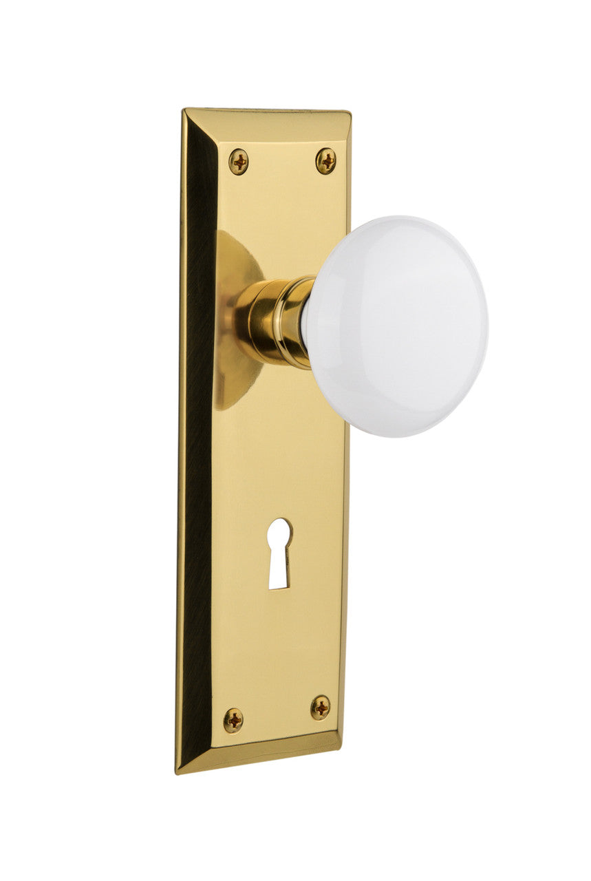 Nostalgic 702923: New York Backplate w/White Porcelain Knob Single Dummy Door Set - Unlacquered Brass