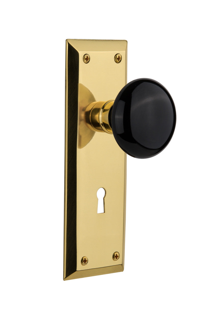Nostalgic 702924: New York Backplate w/Black Porcelain Knob Single Dummy Door Set - Unlacquered Brass