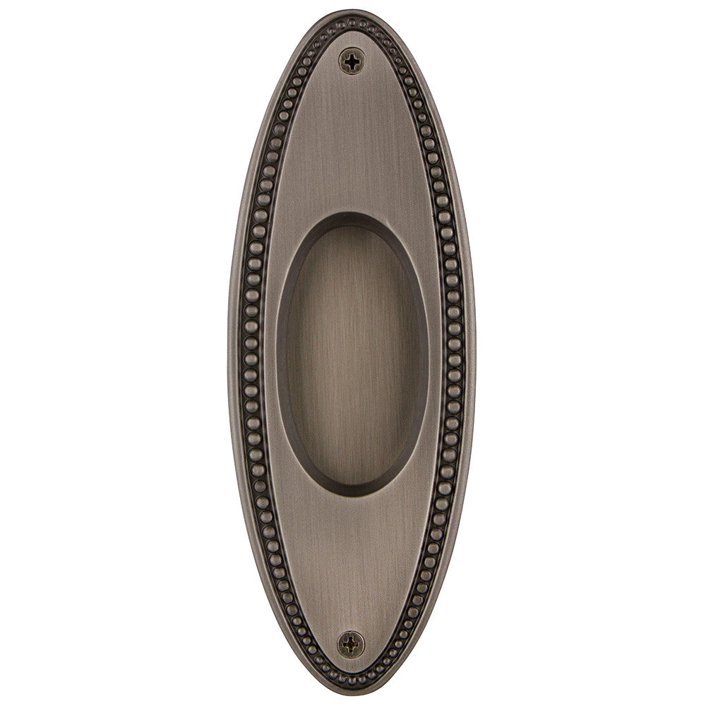 Nostalgic Warehouse 703010: 6-3/4" Oval Beaded Flush Door Pull - Antique Pewter