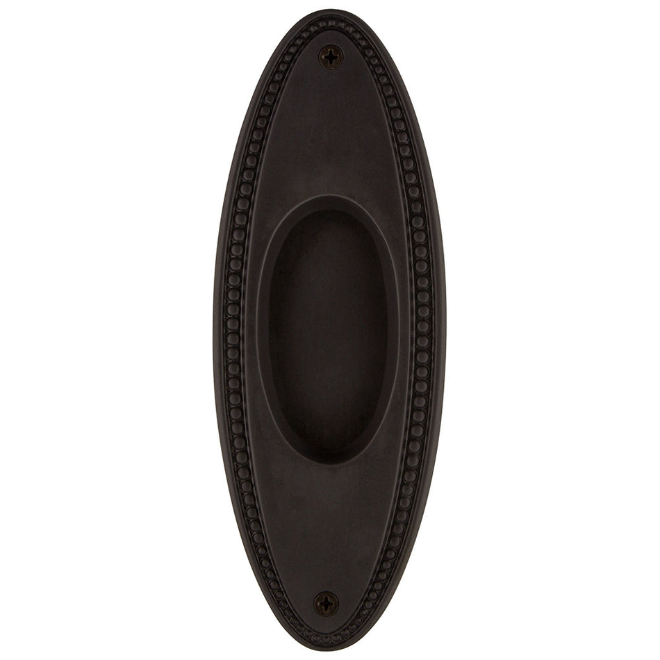 Nostalgic Warehouse 703011: 6-3/4" Oval Beaded Flush Door Pull - Oil-Rubbed Bronze