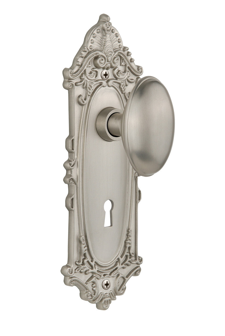 Nostalgic 704032: Victorian Backplate w/Homestead Knob Passage Door Set - Satin Nickel