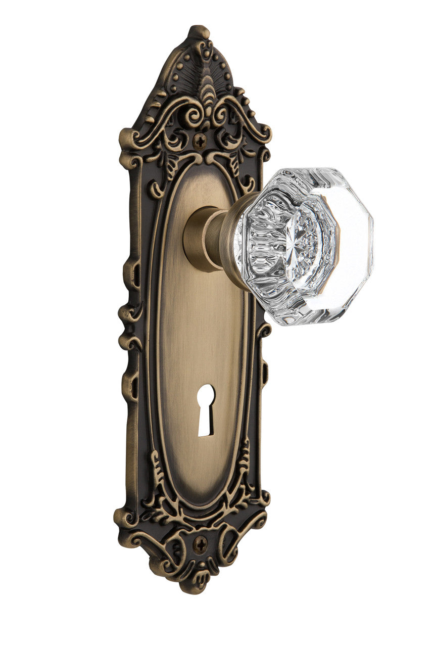 Nostalgic 704082: Victorian Backplate w/Waldorf Knob Passage Door Set - Antique Brass