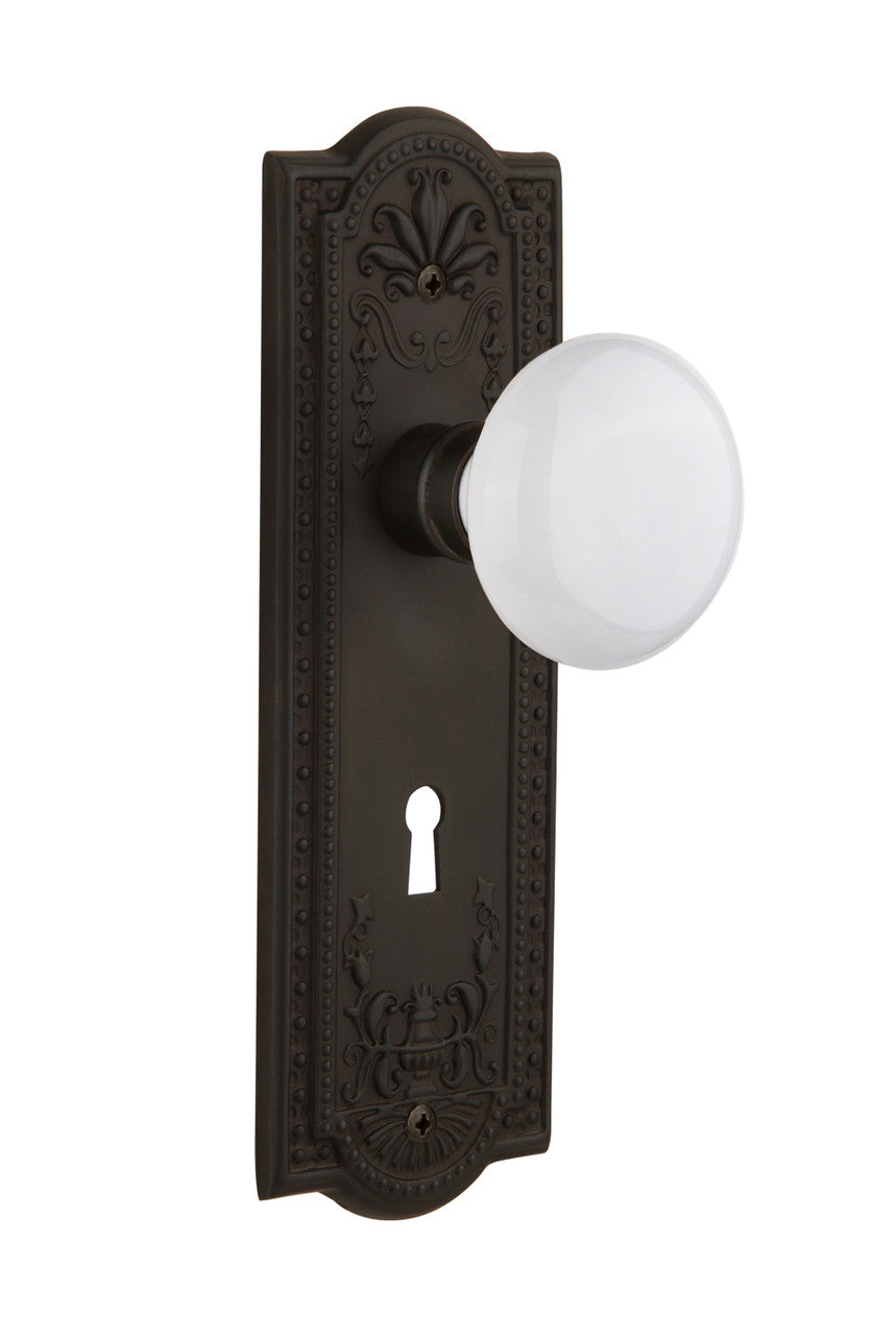 Nostalgic 704425: Meadows Backplate w/White Porcelain Knob Privacy Door Set - Oil-Rubbed Bronze