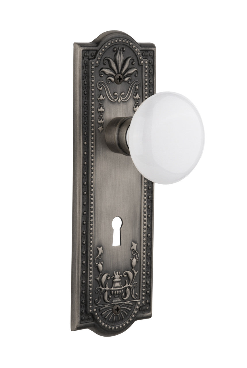 Nostalgic 704426: Meadows Backplate w/White Porcelain Knob Passage Door Set - Antique Pewter