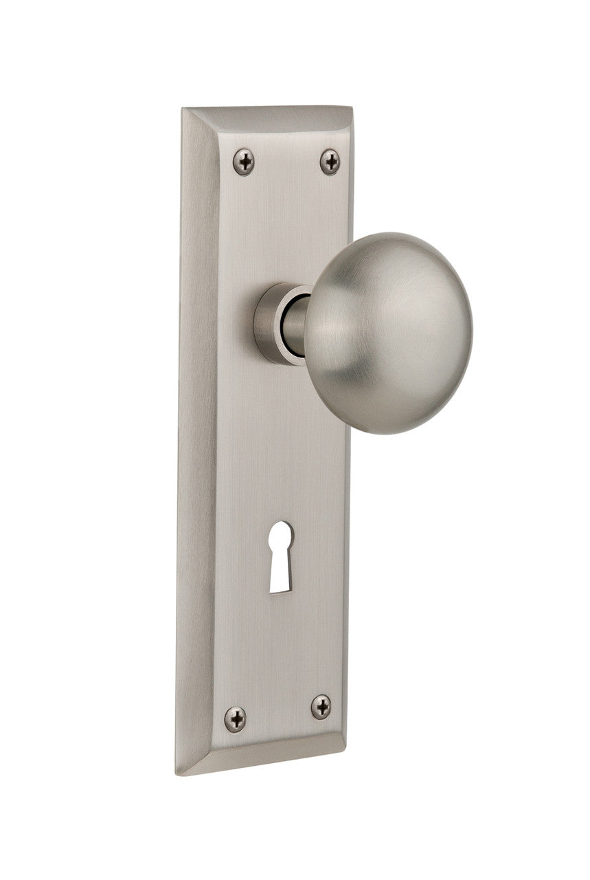 Nostalgic 704537: New York Backplate w/New York Knob Privacy Door Set - Satin Nickel