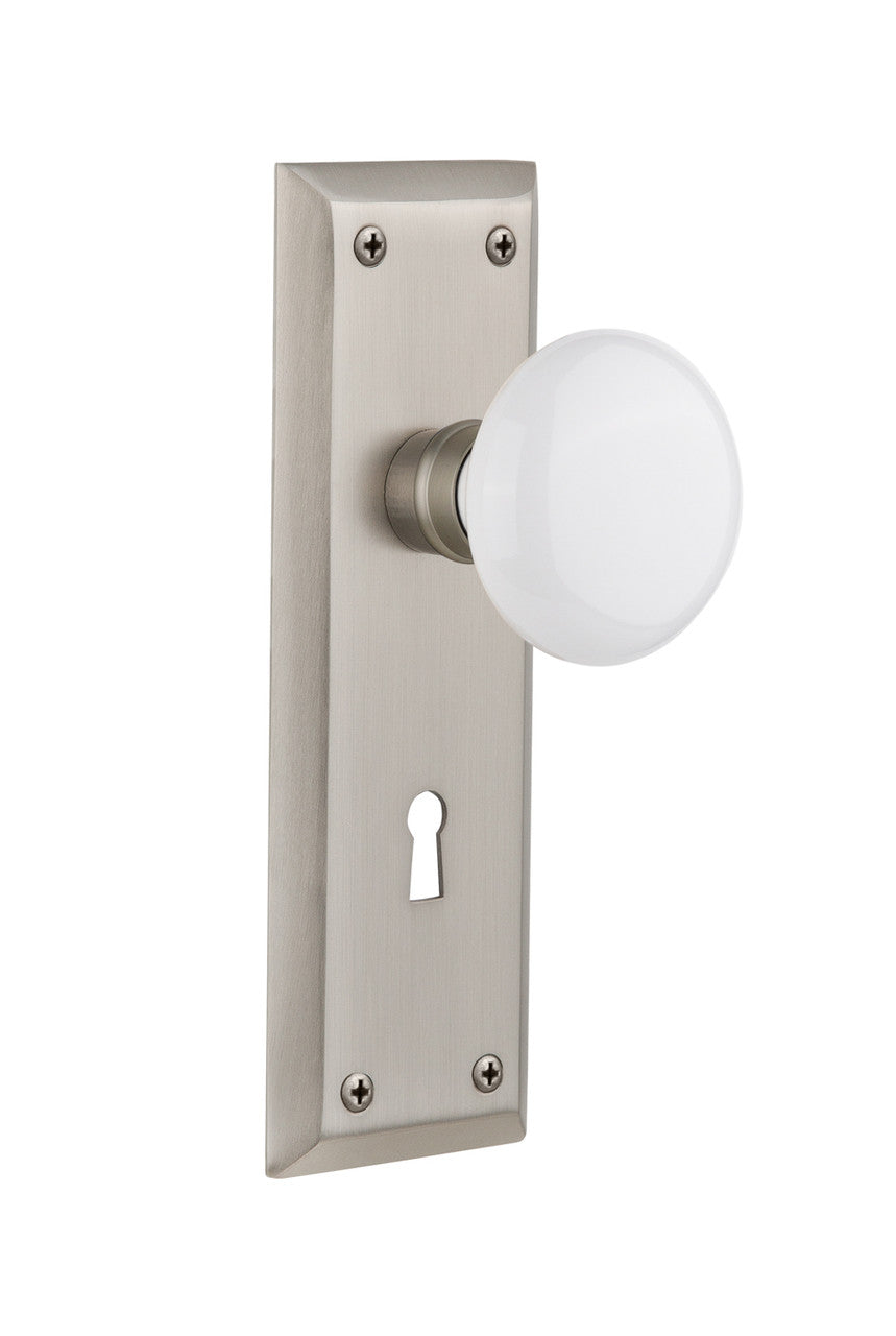Nostalgic 704638: New York Backplate w/White Porcelain Knob Passage Door Set - Satin Nickel
