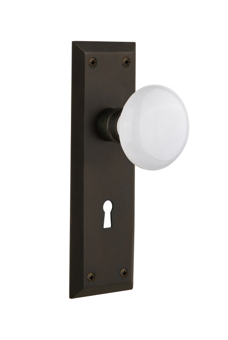 Nostalgic 704639: New York Backplate w/White Porcelain Knob Passage Door Set - Oil-Rubbed Bronze