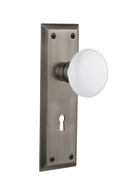 Nostalgic 704647: New York Backplate w/White Porcelain Knob Single Dummy Door Set - Antique Pewter