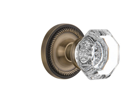 Nostalgic 704700: Rope Rosette w/Waldorf Knob Passage Door Set - Antique Brass
