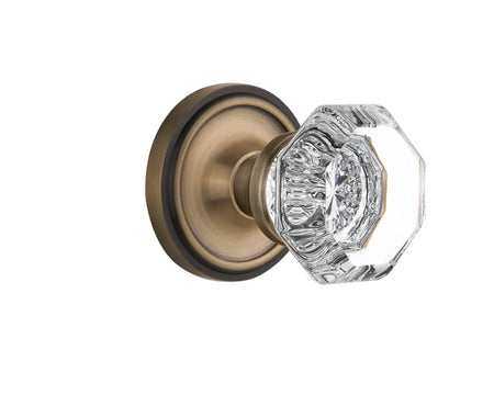 Nostalgic 704824: Classic Rosette w/Waldorf Knob Passage Door Set - Antique Brass