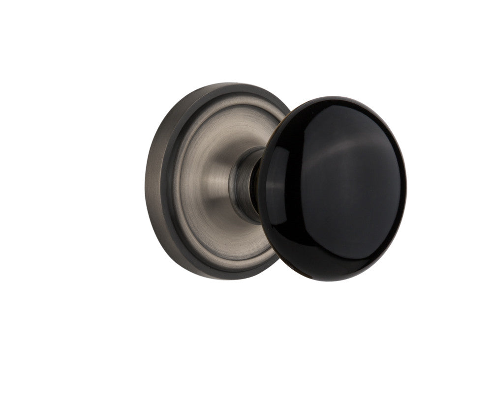 Nostalgic 710001: Classic Rosette w/Black Porcelain Knob Passage Door Set - Antique Pewter
