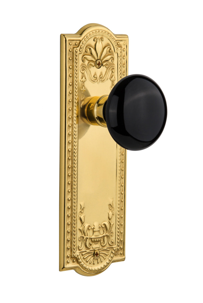 Nostalgic 710018: Meadows Backplate w/Black Porcelain Knob Passage Door Set - Polished Brass