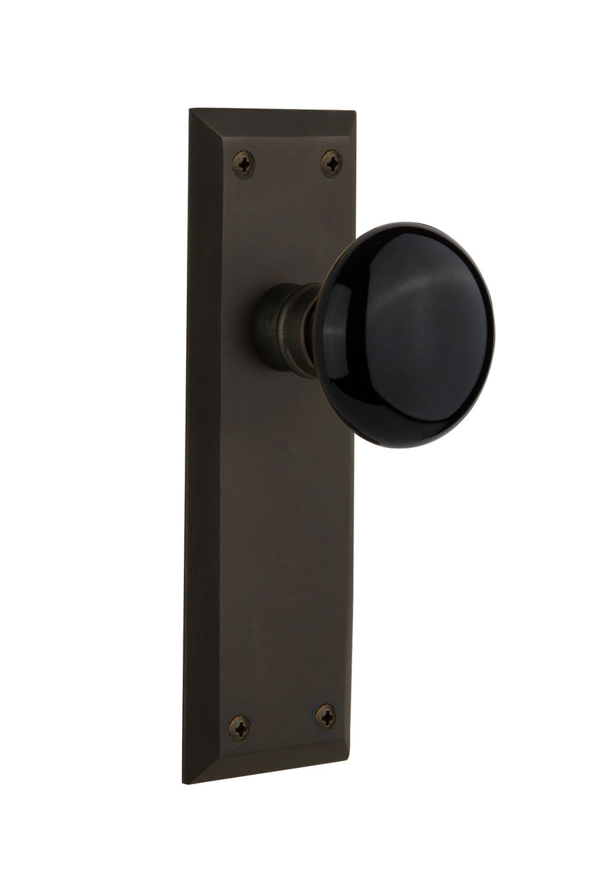 Nostalgic 710024: New York Backplate w/Black Porcelain Knob Passage Door Set - Oil-Rubbed Bronze