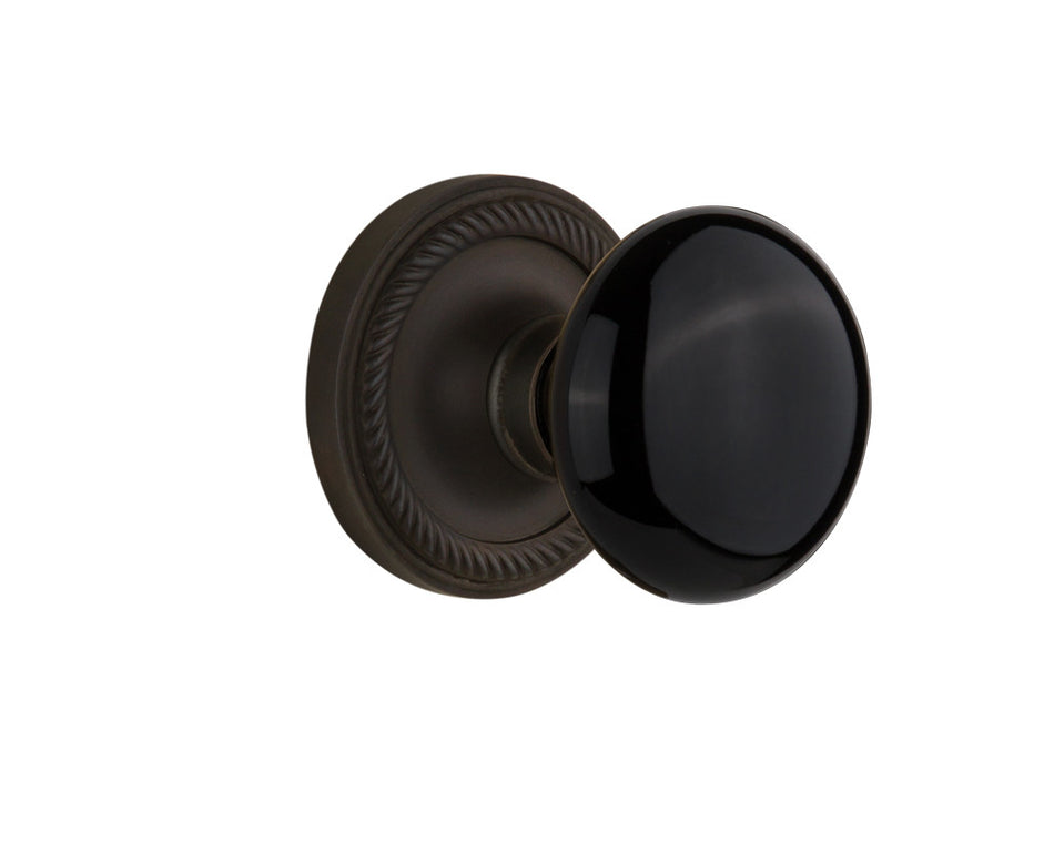 Nostalgic 710031: Rope Rosette w/Black Porcelain Knob Passage Door Set - Oil-Rubbed Bronze