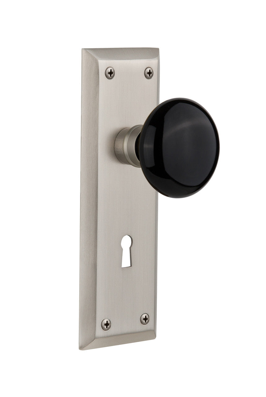 Nostalgic 710080: New York Backplate w/Black Porcelain Knob Passage Door Set - Satin Nickel