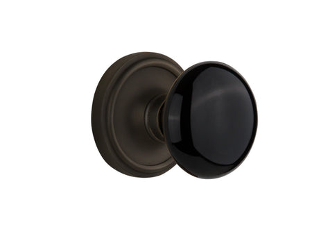 Nostalgic 710099: Classic Rosette w/Black Porcelain Knob Single Dummy Door Set - Oil-Rubbed Bronze