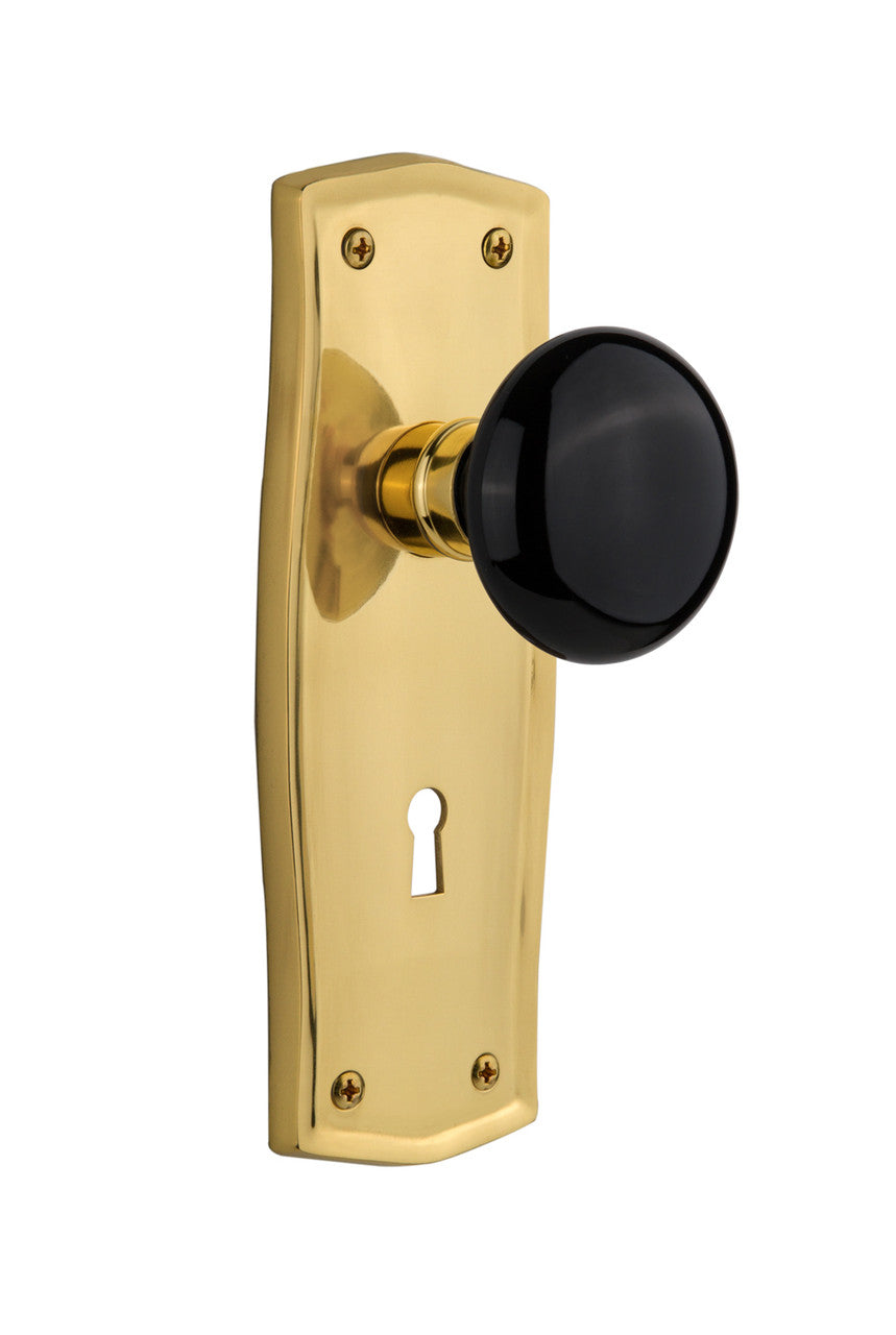 Nostalgic 710182: Prairie Backplate w/Black Porcelain Knob Single Dummy Door Set - Polished Brass