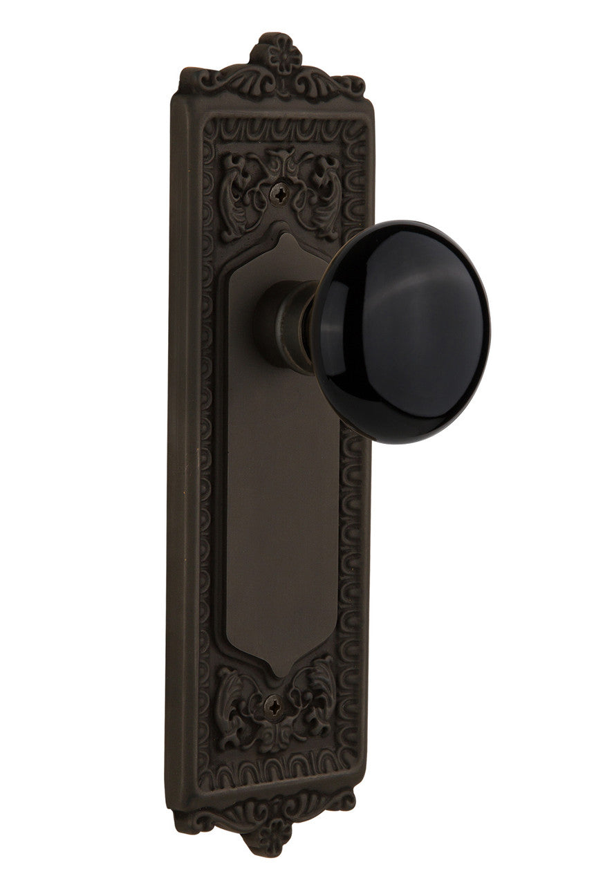Nostalgic 710298: Egg & Dart Backplate w/Black Porcelain Knob Privacy Door Set - Oil-Rubbed Bronze