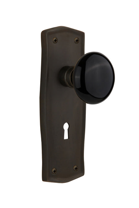 Nostalgic 710373: Prairie Backplate w/Black Porcelain Knob Privacy Door Set - Oil-Rubbed Bronze