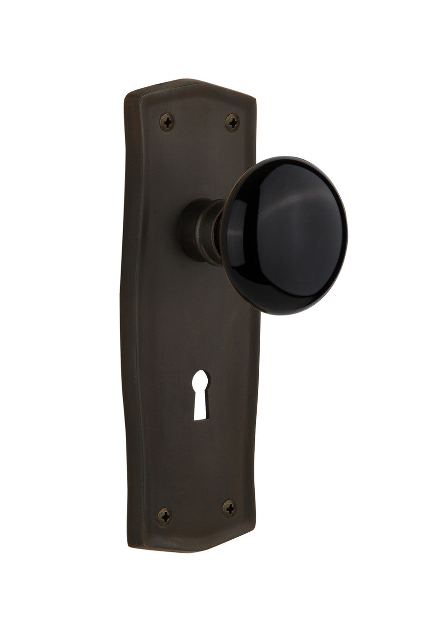 Nostalgic 710373: Prairie Backplate w/Black Porcelain Knob Privacy Door Set - Oil-Rubbed Bronze