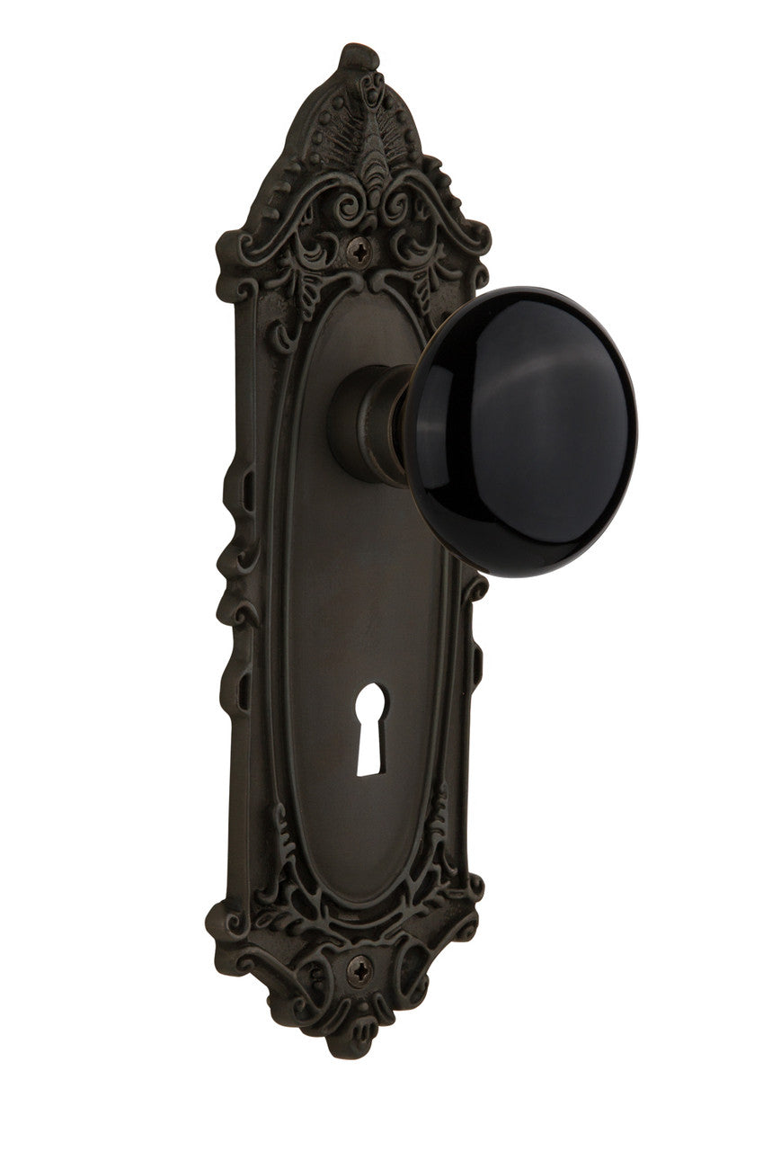 Nostalgic 710380: Victorian Backplate w/Black Porcelain Knob Privacy Door Set - Oil-Rubbed Bronze