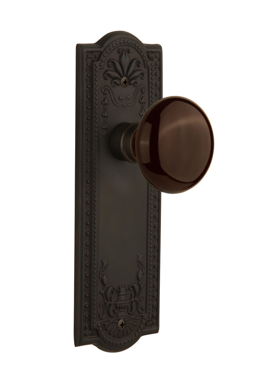 Nostalgic 710457: Meadows Backplate w/Brown Porcelain Knob Passage Door Set - Oil-Rubbed Bronze
