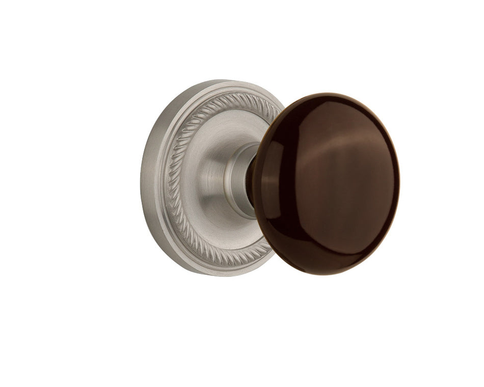 Nostalgic 710473: Rope Rosette w/Brown Porcelain Knob Passage Door Set - Satin Nickel