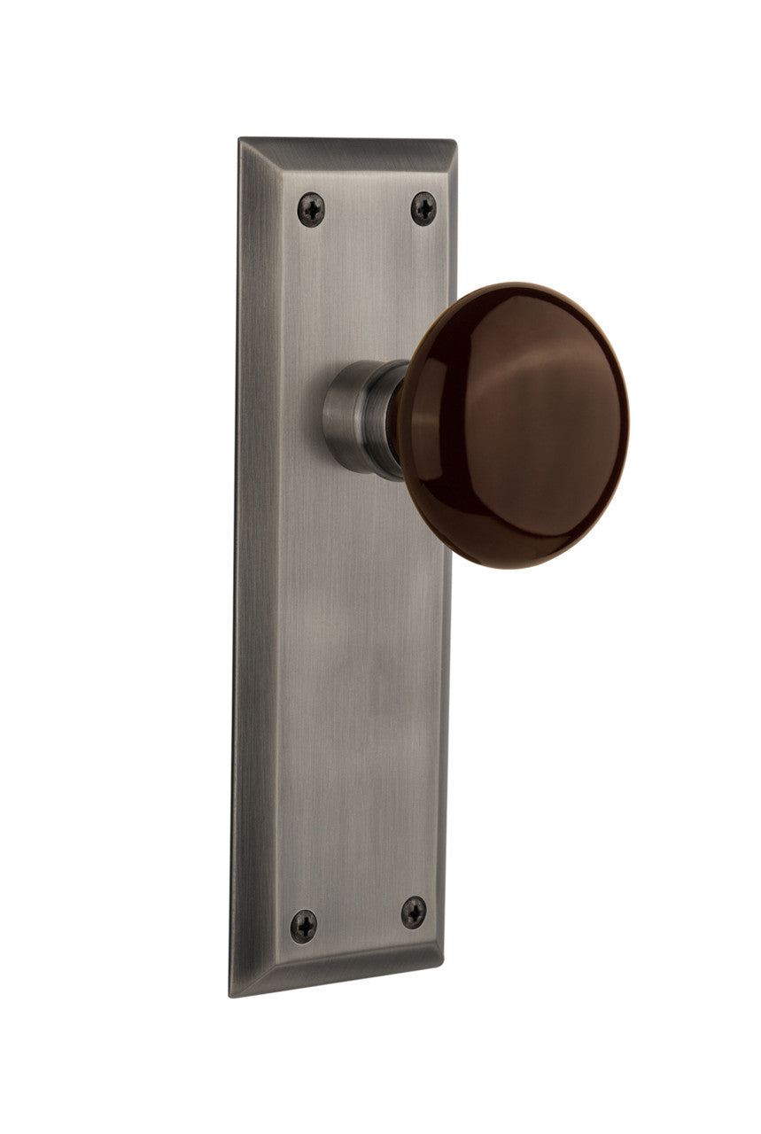 Nostalgic 710558: New York Backplate w/Brown Porcelain Knob Single Dummy Door Set - Antique Pewter