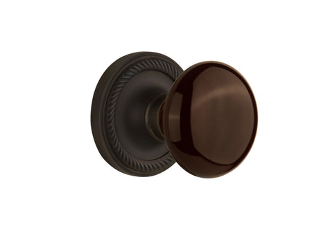 Nostalgic 710567: Rope Rosette w/Brown Porcelain Knob Single Dummy Door Set - Oil-Rubbed Bronze