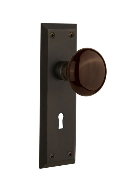 Nostalgic 710614: New York Backplate w/Brown Porcelain Knob Single Dummy Door Set - Oil-Rubbed Bronze