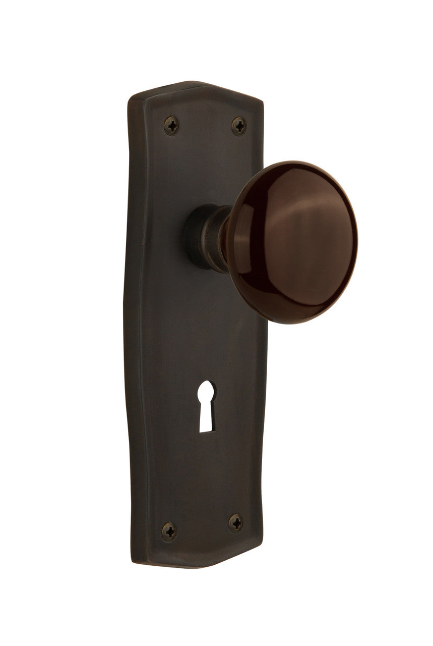 Nostalgic 710621: Prairie Backplate w/Brown Porcelain Knob Single Dummy Door Set - Oil-Rubbed Bronze