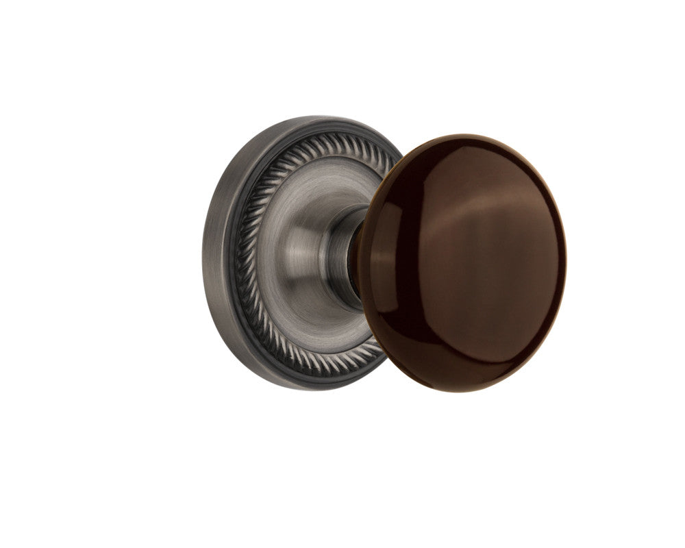 Nostalgic 710757: Rope Rosette w/Brown Porcelain Knob Privacy Door Set - Antique Pewter