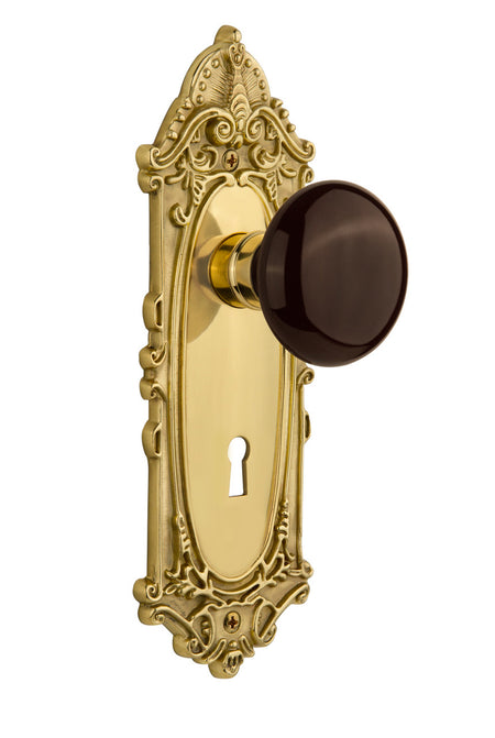 Nostalgic 710821: Victorian Backplate w/Brown Porcelain Knob Privacy Door Set - Polished Brass