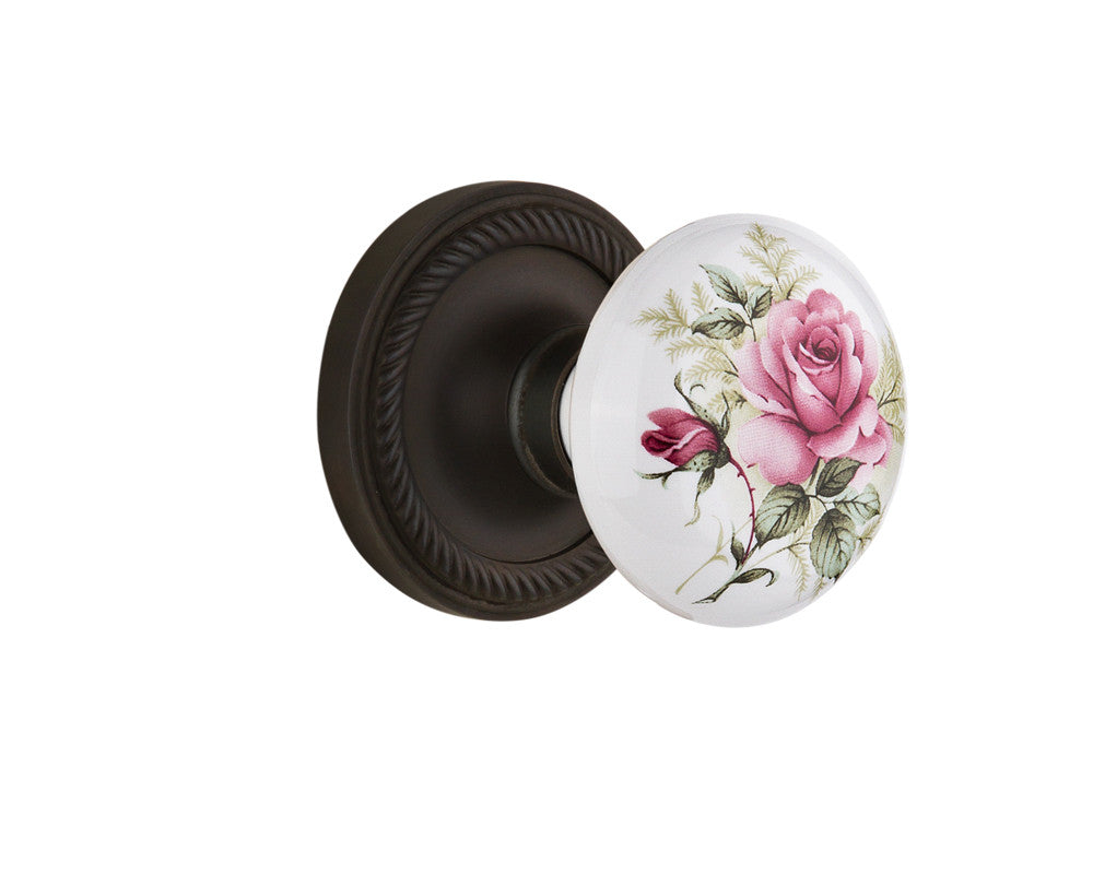Nostalgic 710911: Rope Rosette w/White Rose Porcelain Knob Passage Door Set - Oil-Rubbed Bronze