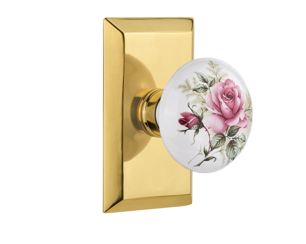 Nostalgic 710931: Studio Backplate w/White Rose Porcelain Knob Passage Door Set - Polished Brass