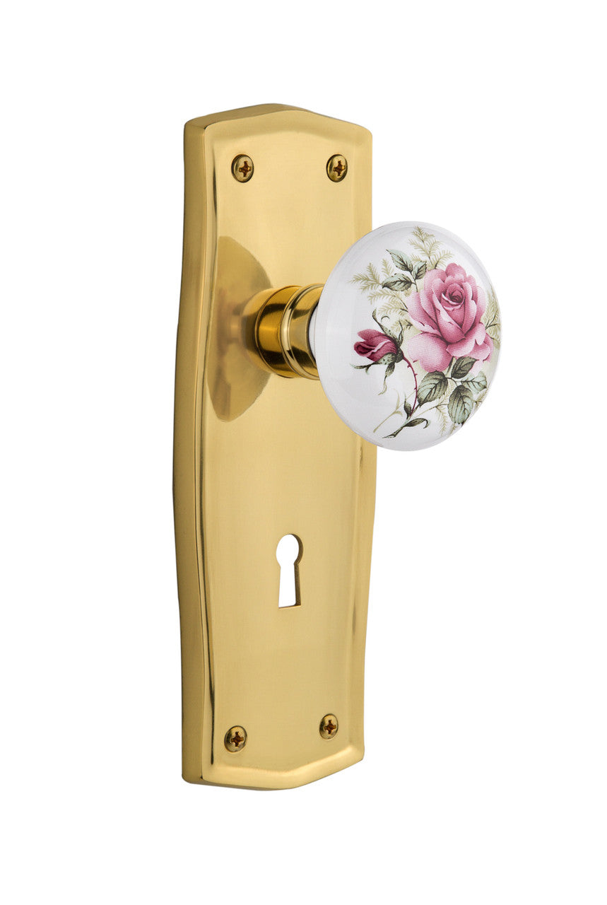 Nostalgic 710966: Prairie Backplate w/White Rose Porcelain Knob Passage Door Set - Polished Brass