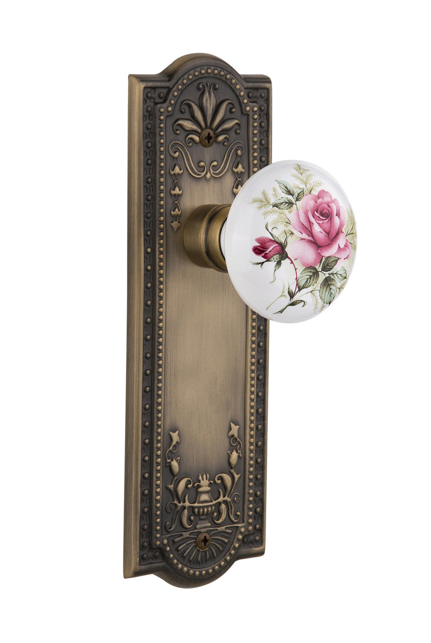 Nostalgic 710990: Meadows Backplate w/White Rose Porcelain Knob Single Dummy Door Set - Antique Brass
